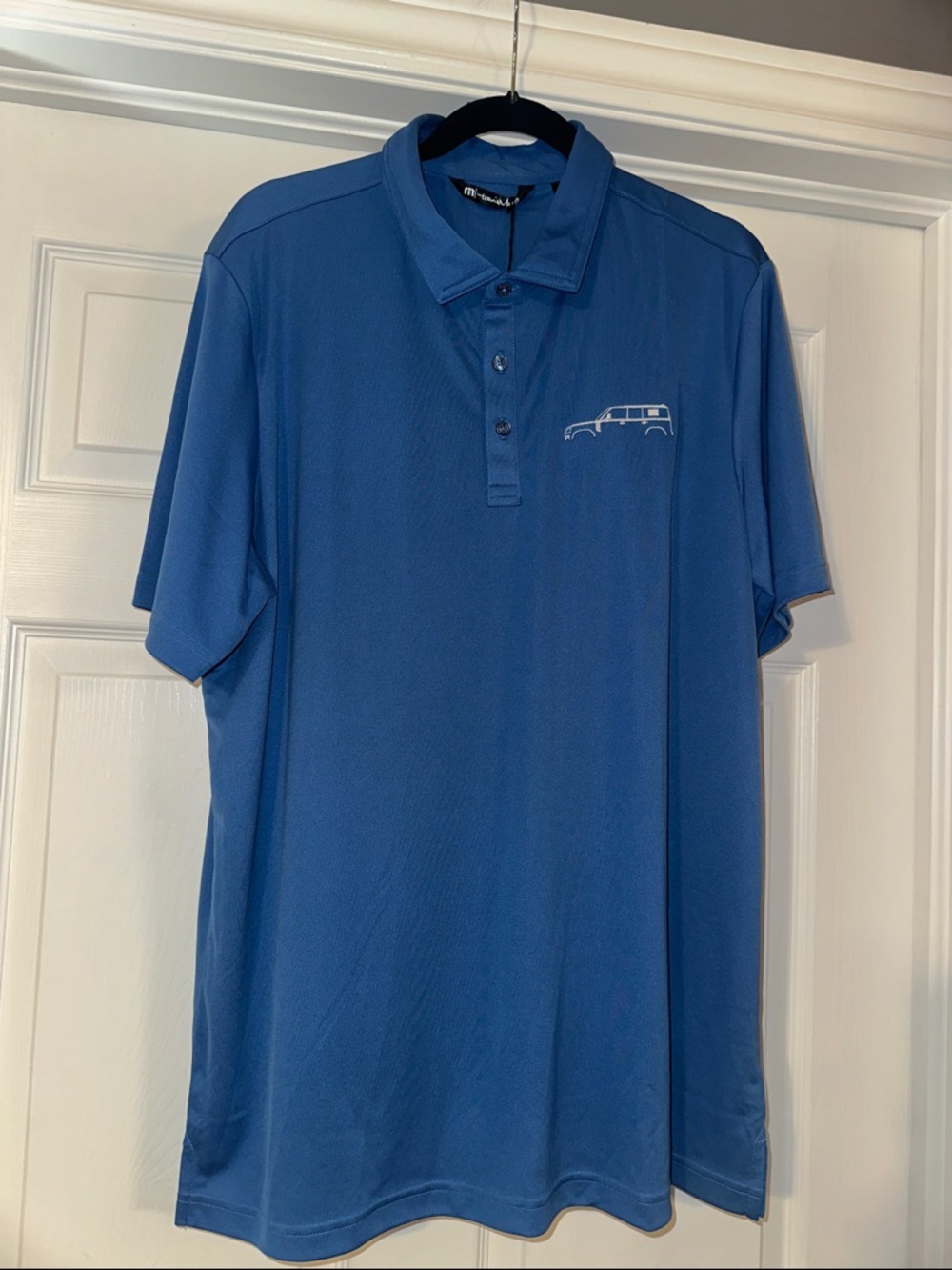 TravisMathew Blue Short-Sleeve Performance Polo with LandRover logo